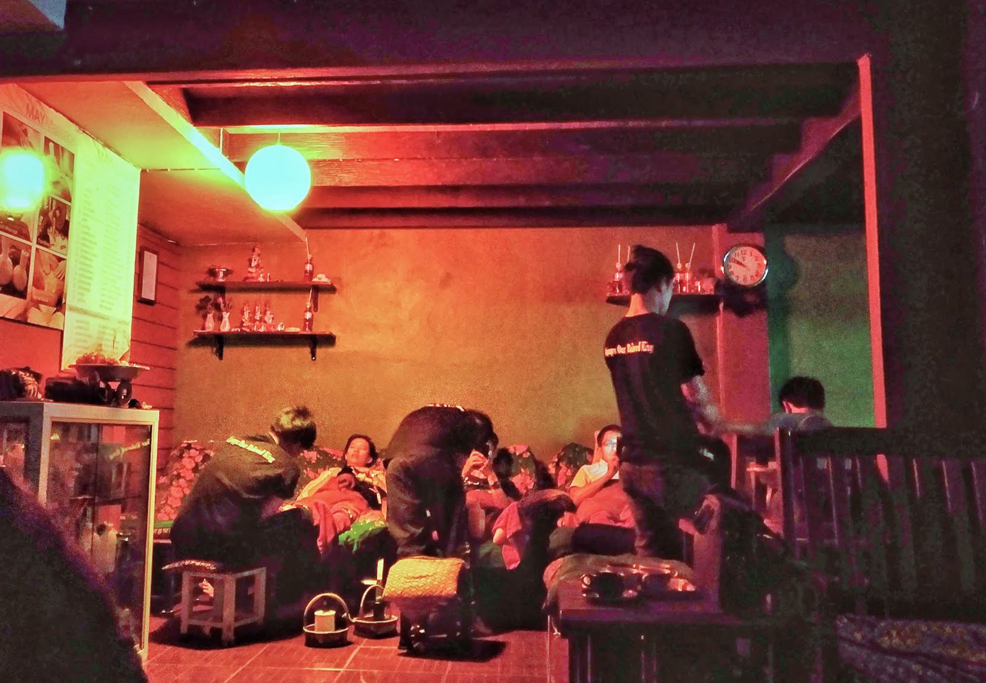 Therapists working in the shared room at May Massage