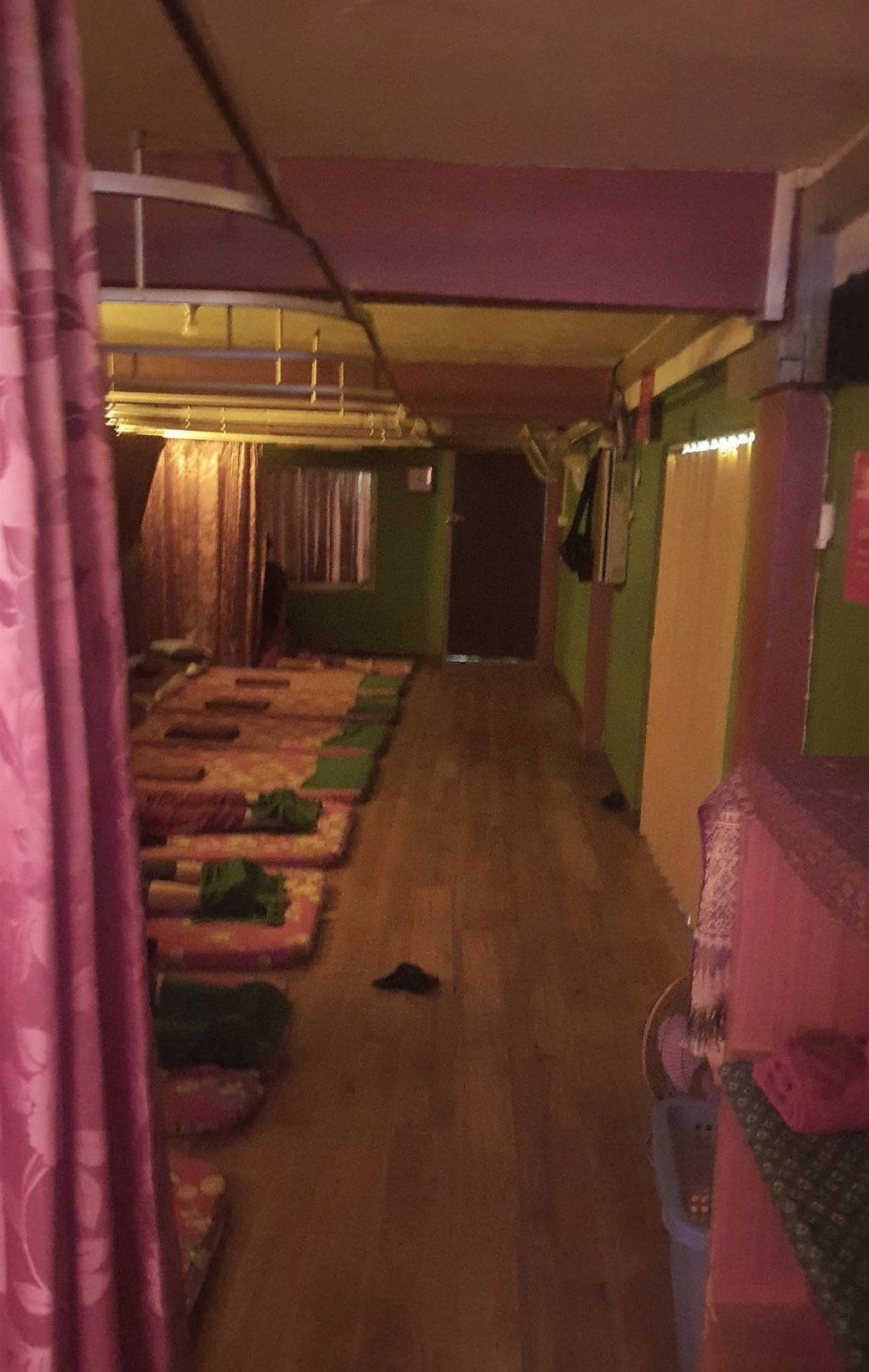 Curtained floor-mat treatment area at May Massage